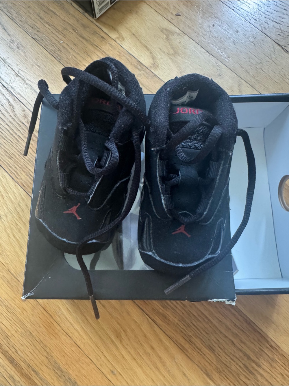 Jordan Kids Black Sneakers with Red Jumpman Accent